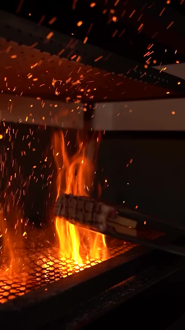 Live-fire cooking film still for Project 08
